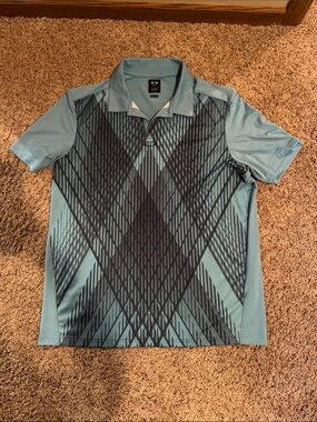 Oakley Men's Sky Blue Polo with Dark Geometric Print